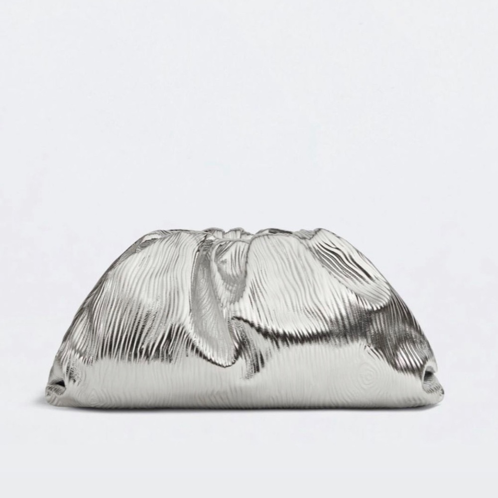Botegga Venetta classic pouch finished in aluminum satin silver never carried